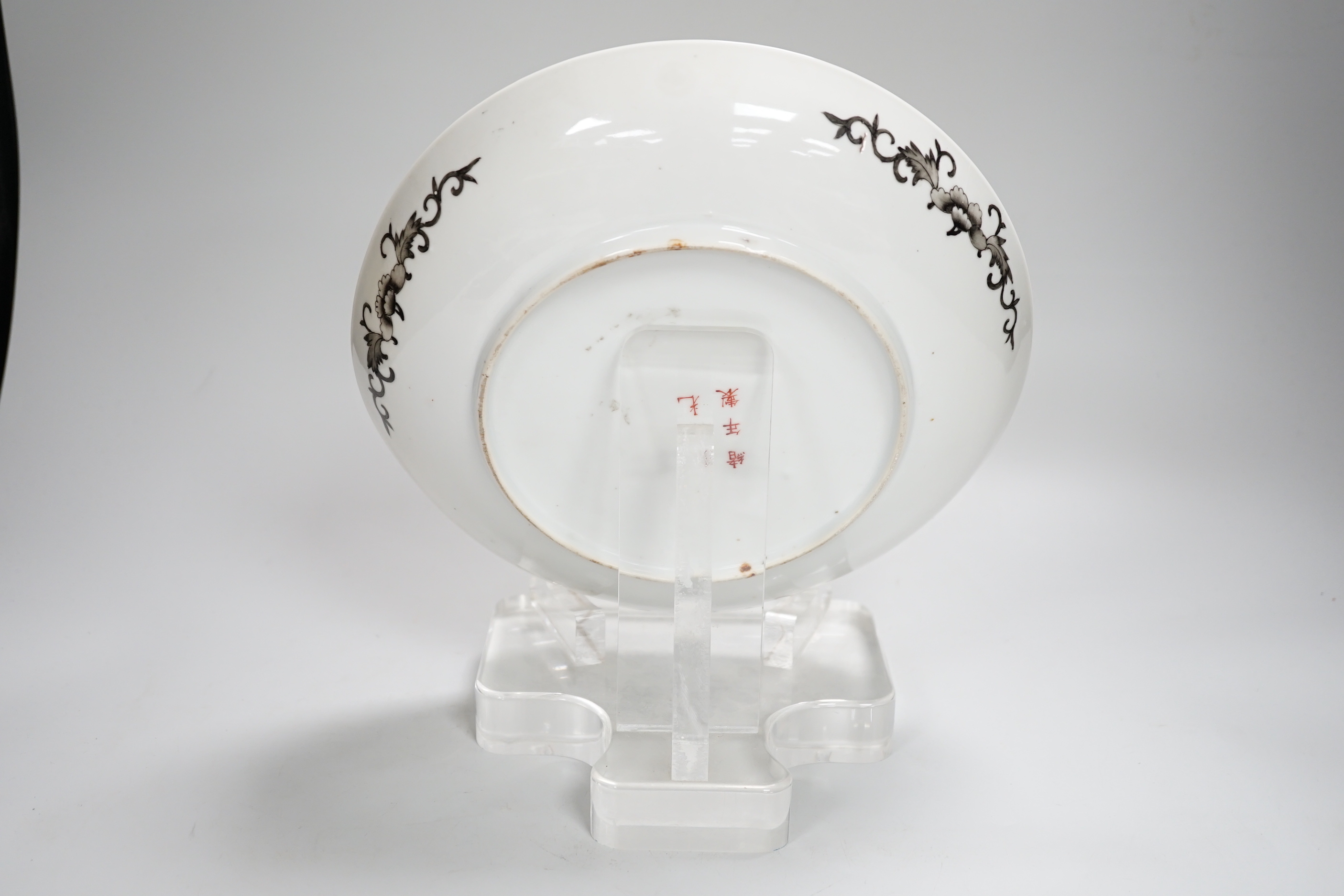 A Chinese grisaille enamel yellow ground dish, Guangxu mark and possibly of the period (1875-1908), 24cm in diameter